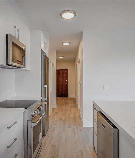 Modern kitchen with stainless steel appliances